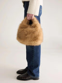 Faux fur tas hochet