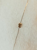 Fijn armbandje met letter E