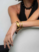 Smalle goudkleurige bangle lumière