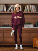 The mercer sweater met logo