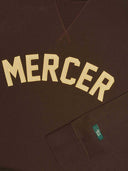 The mercer sweater met logo