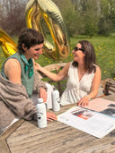Witte waterfles met logo 60 jaar