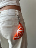 Orange keychain CJ x Marie Marie