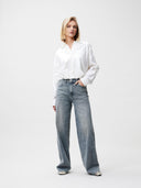 Loose fit jeans tinted blue