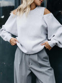 Grijze sweater met open schouders