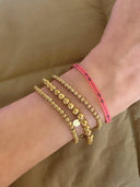 Armband met gouden balletjes medium