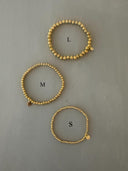 Armband met gouden balletjes medium
