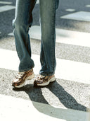 The re-run sneakers cracked brown