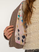 Beige wollen jacket nuklima