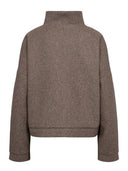 Beige wollen jacket nuklima