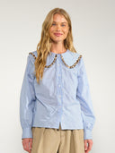 Lichtblauwe blouse numayana
