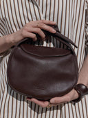 Bruine tas coco croissant