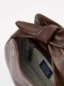 Bruine tas coco croissant