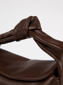 Bruine tas coco croissant