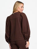 Bruine top met pofmouwen