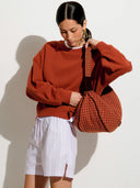 Oranje sweater inea